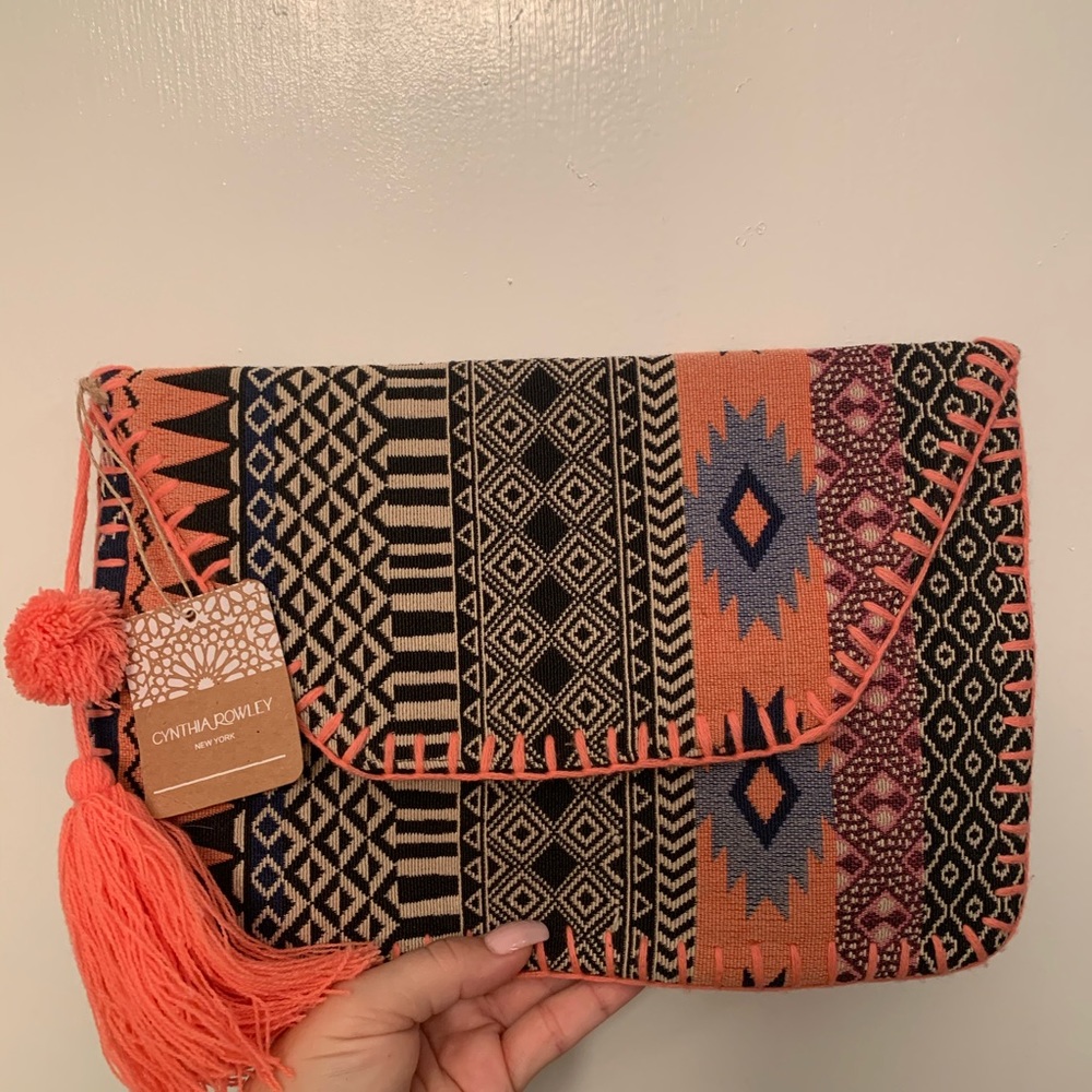NWT  Cynthia Rowley New York Aztec clutch bag with a coral tassel.